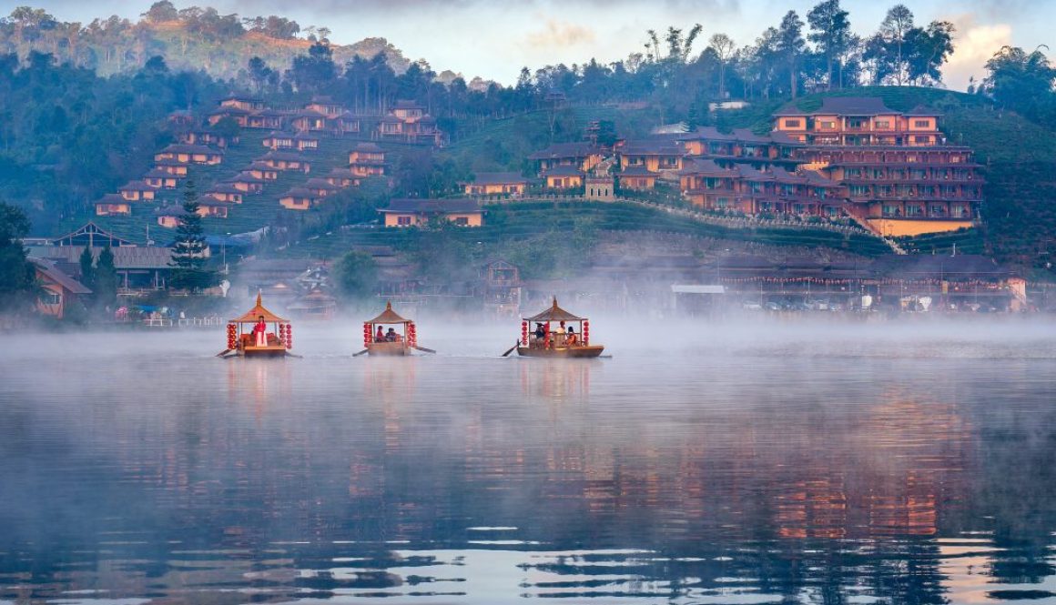 Tourists take a boat at Ban Rak Thai village in Mae Hong Son pro